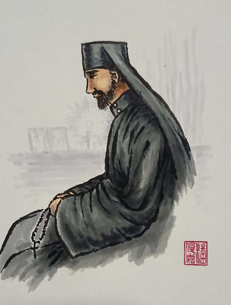 Hieromonk praying with chotki (prayer robe)